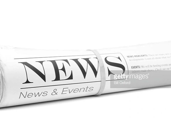 News and events paper rolled up